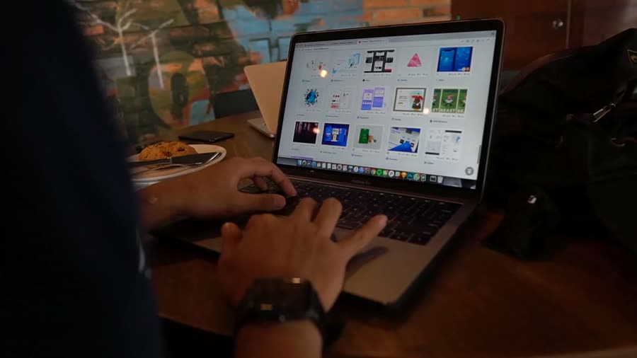 Designer working at a laptop